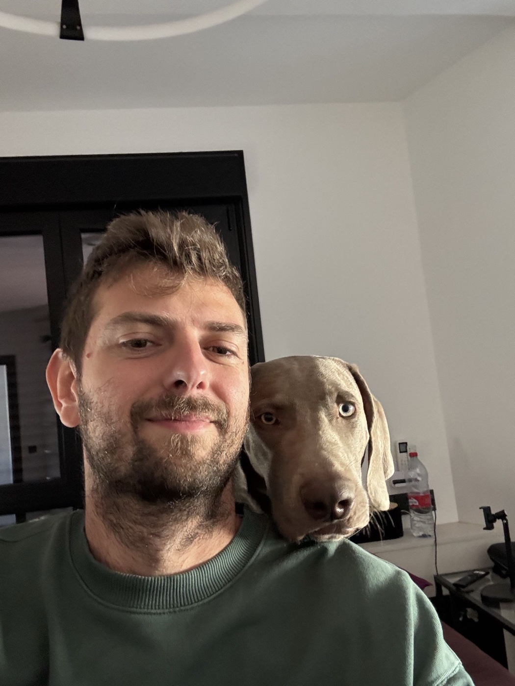 Miguel, the construction company owner who built his ERP software in Rork, with his dog